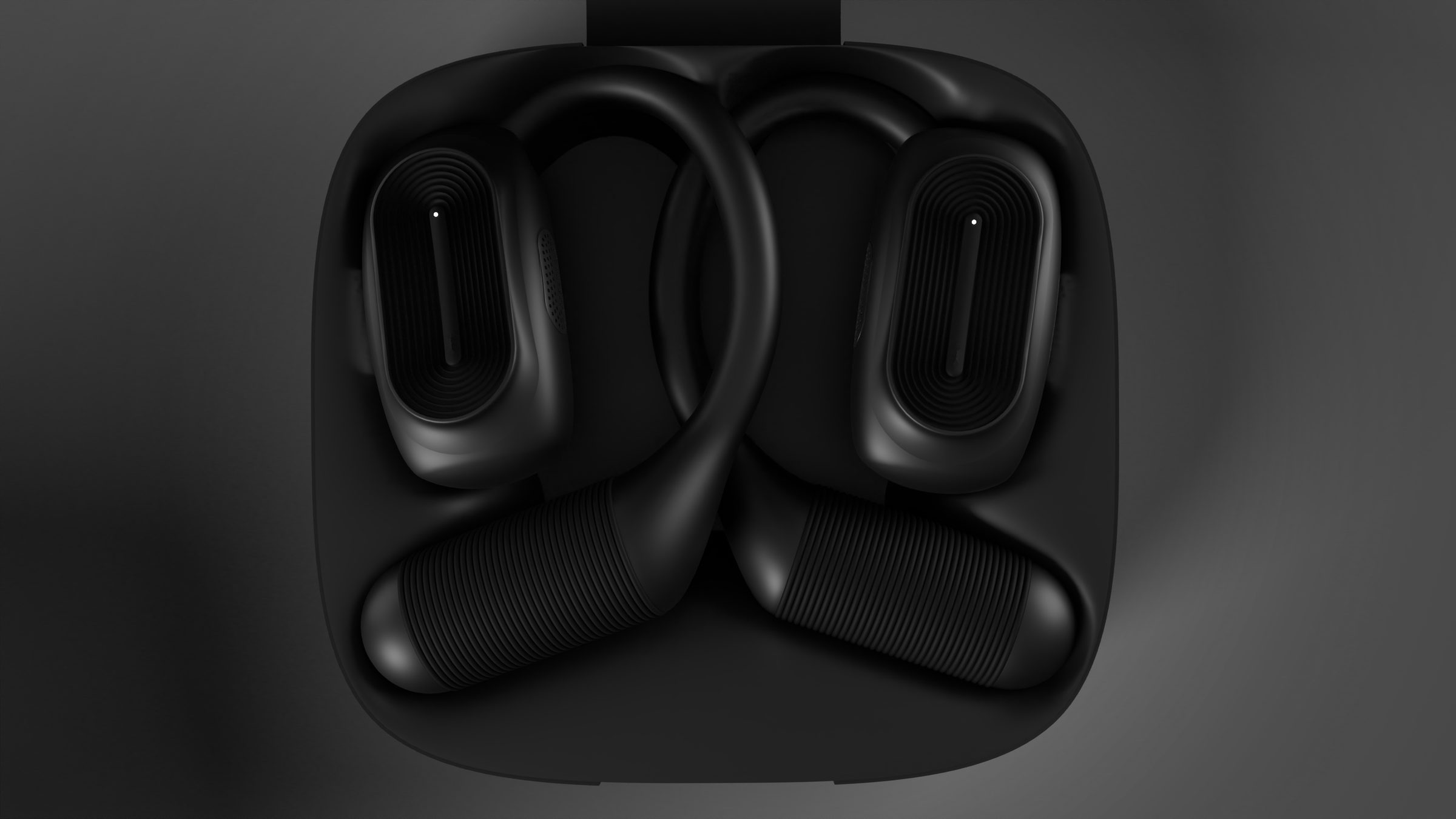 Black ear-hook open-wear earbuds nested in their case, top view