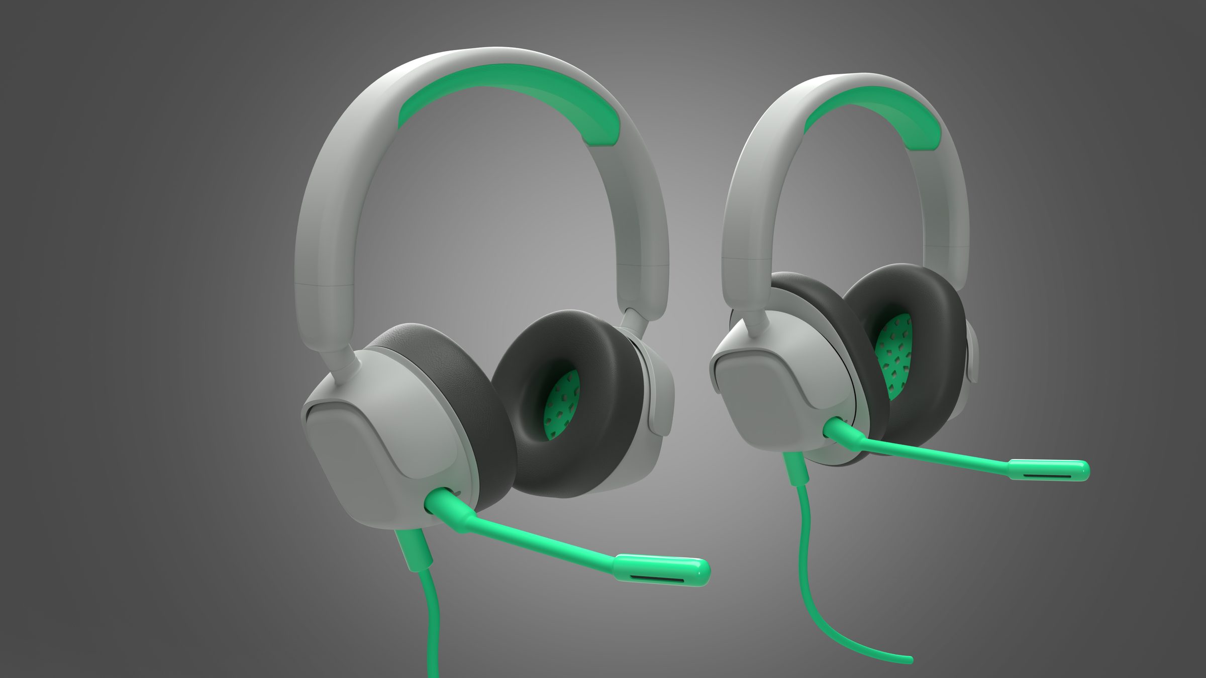 Two grey kids' study headsets with green accents and boom microphones