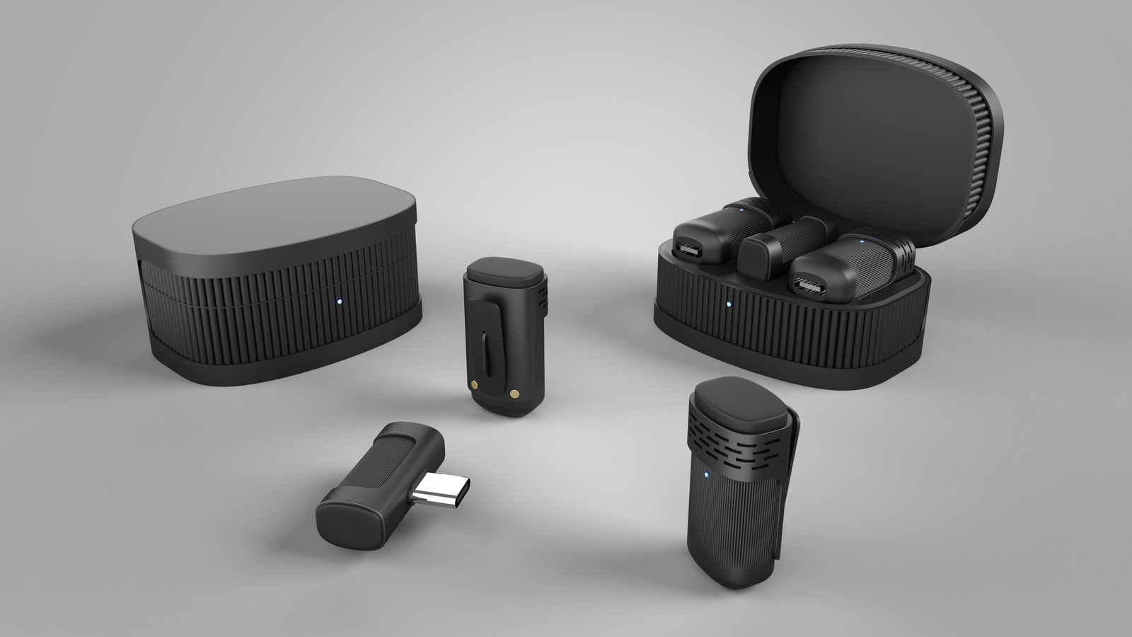 Black wireless recorder kit with clip-on units, USB-C receiver and charging case